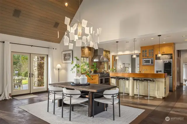 Dining room off kitchen opens out to patio