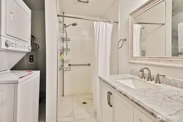 3/4 bath with utility room on main level along with the primary bedroom.