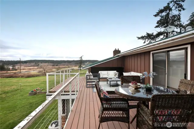 enjoy pastoral and harbor views from the deck
