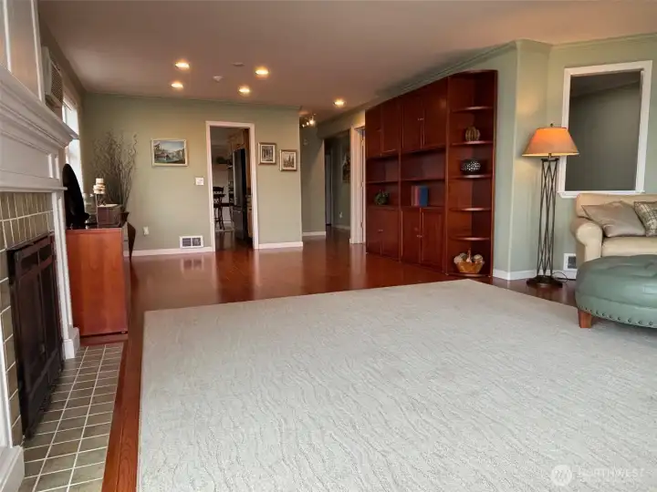Dining area next to kitchen, den on the right