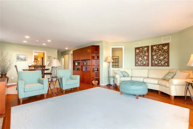 Den has open window to the living space and view.