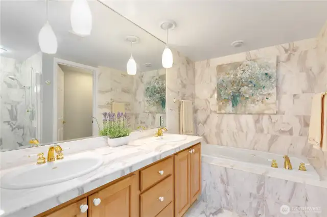 Five piece primary bath with jetted tub.