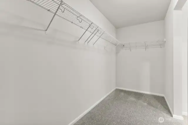 Primary WIC-Disclaimer- Photos are of Model home from previous community and are for illustrative purposes only. Finishes, flooring, features, and upgrades, may vary