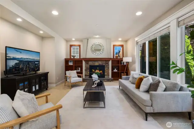 Family Room with gas fireplace and built in shelf