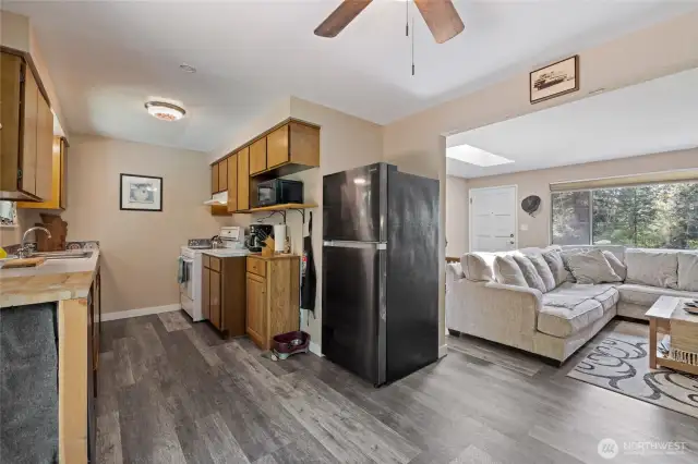 Convenient flow into the kitchen with seperate dining space.