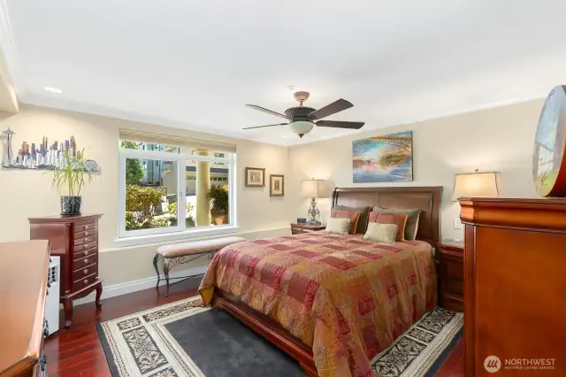 Primary suite w/lux bath & walk-in closet w/California Closet built ins.