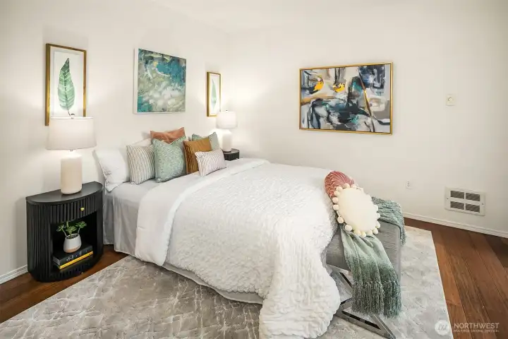 The Primary bedroom has a large walk-in closet and private 1/2 bath.