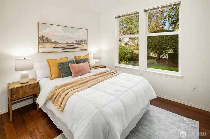 The second bedroom with its south facing windows offers lots of natural light for guests, an office, a craft room, or whatever you need.