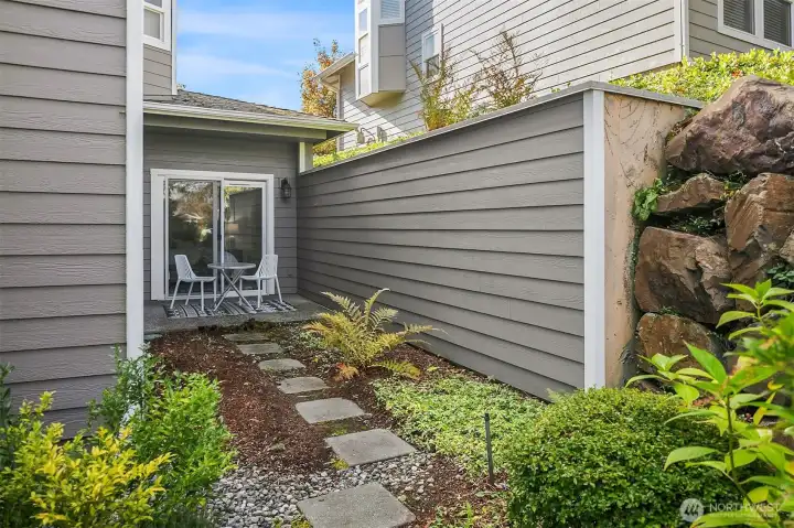 Pavers take you from the lawn area to your private patio.