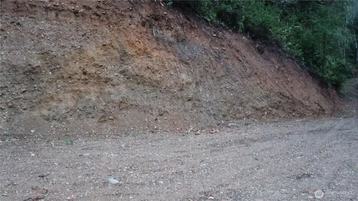 Nice clear driveway to the open area with the mountains view and hood canal.