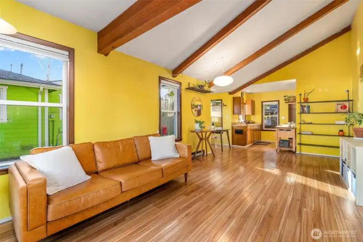 Exposed beams and vaulted ceilings make this small house live large