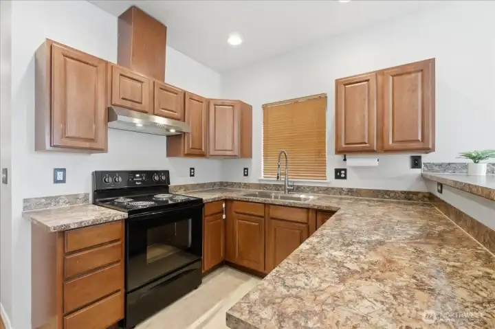 "No matter where I serve my guests, they seem to love my kitchen best"!