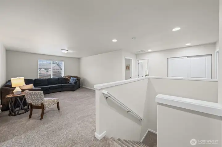 Head upstairs to the large bonus space. Great for kids or even a movie room