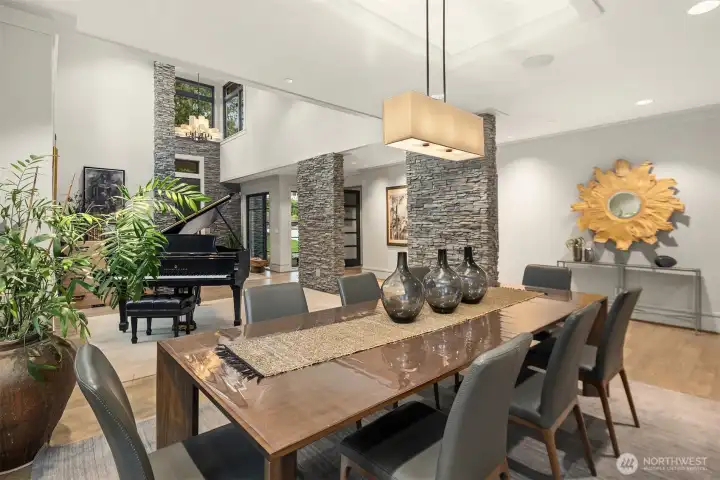 Open flow with the soaring living area, awash in light from clerestory windows.