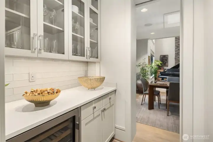 Handy butler's pantry featuring a 36-bottle SubZero wine fridge.