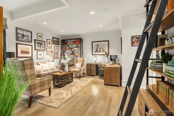 Double doors open to the main floor bedroom suite, perfect for guests, an office, or multi-generational living.