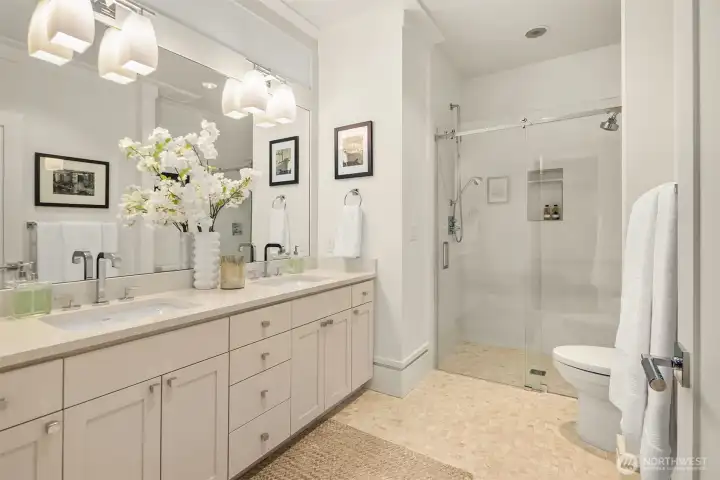 Full en-suite bath in the main floor bedroom.