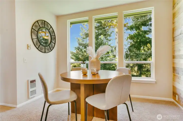 Walls of windows bathe in natural light in your dining area, the perfect project space to be inspired.