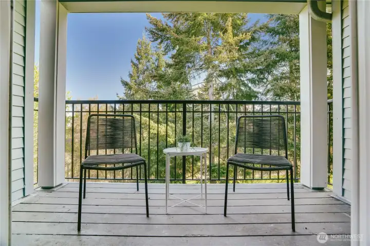 Your outdoor oasis - and to the left there is a private storage area.