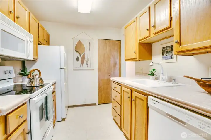 The closet is a place to add your own stack washer dryer and/or have an extended pantry.
