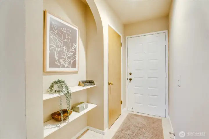 Cute entry with a place for your keys, shoes and inspirational items.