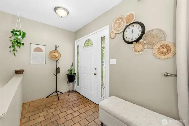 Foyer welcomes you into this mid-century daylight rambler
