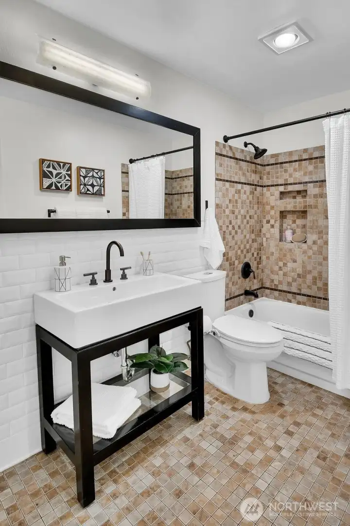 Detailed tile work in bathroom.