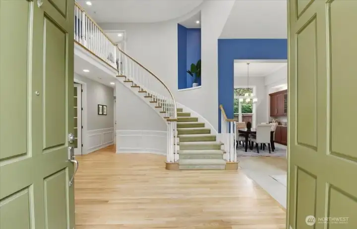 Gorgeous entry way with soaring ceilings and dramatic staircase. Gorgeous entry way with soaring ceilings and dramatic staircase.