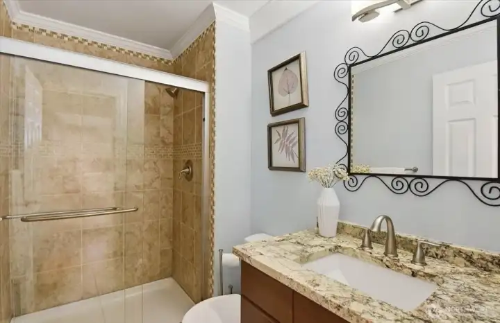 There is a 3/4 bath on the main floor situated across from the main floor bedroom. There is a 3/4 bath on the main floor situated across from the main floor bedroom.