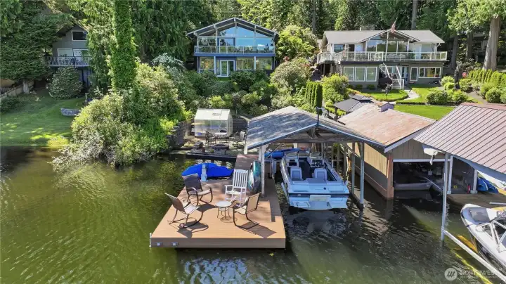 Boathouse, dock, greenhouse, and home
