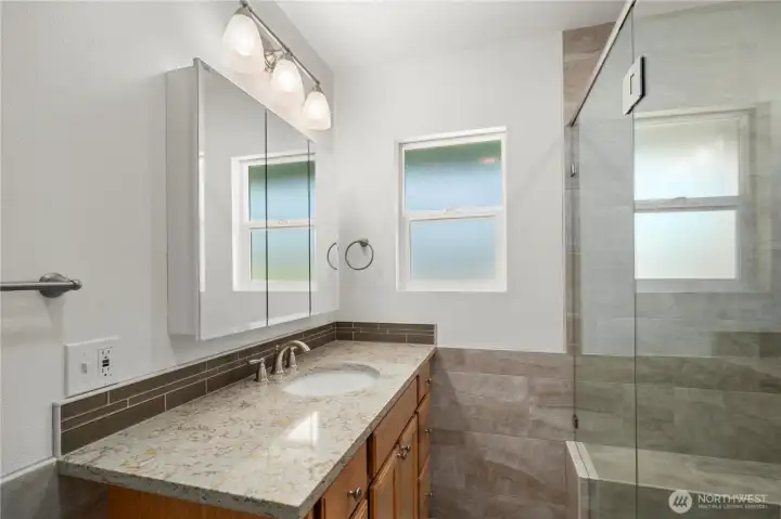 Primary ensuite bathroom - main floor.