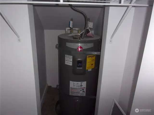 Electric water heater with earthquake strapping.