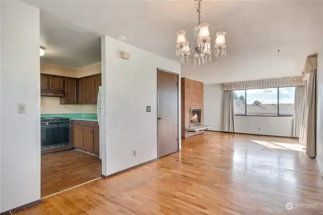 Dining, kitchen to left, looking towards living room.