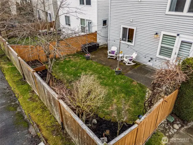 Fully fenced yard with patio, Mt Si views, raised garden bed plus a storage shed for all your toys