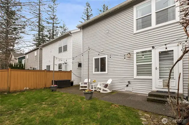 Lives just like a traditional 2 story home, but offering all the advantages of condo living.   The HOA maintains the exterior including the siding, roof, gutters, landscaping & porch.   They even mow the fenced backyard!