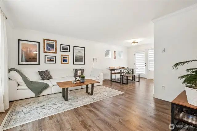 Exquisitely updated throughout.   Note the luxury vinyl plank flooring, no carpet in the home!