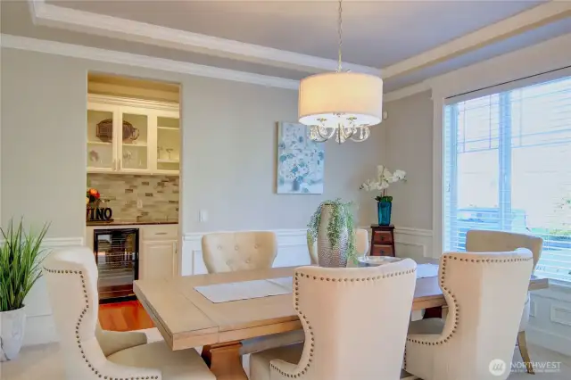 Formal dining room connects to butlers pantry for easy entertaining.