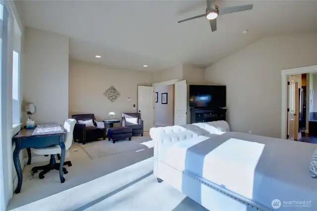 Primary bedroom also has sitting area.