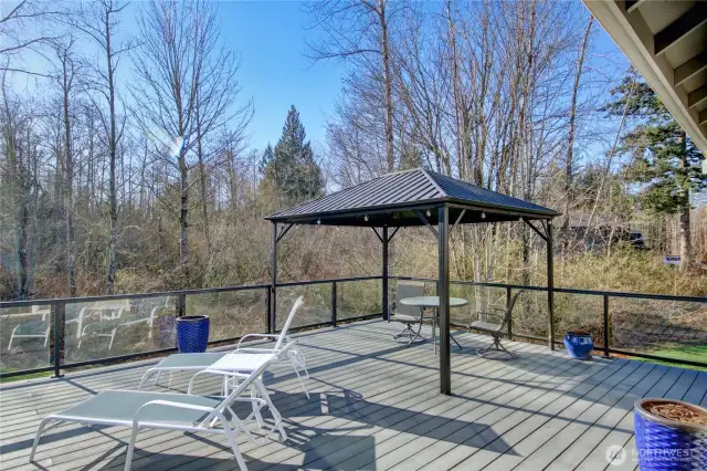 Deck off of kitchen for outdoor entertaining.