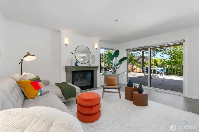 Living room with sliding glass door that opens onto your near 1000 ft.² private patio. Wow!
