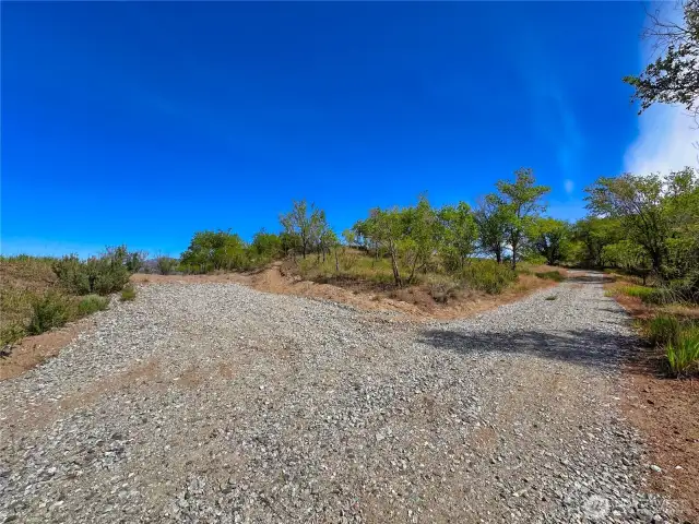 Recently graveled road to lower & upper tiers of property