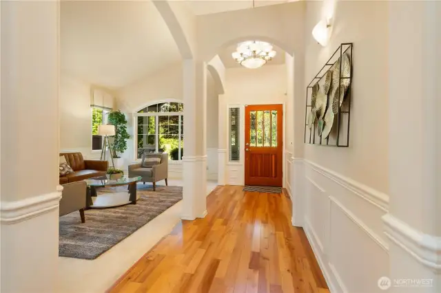 Beautiful wood floor entry and right to the bedrooms