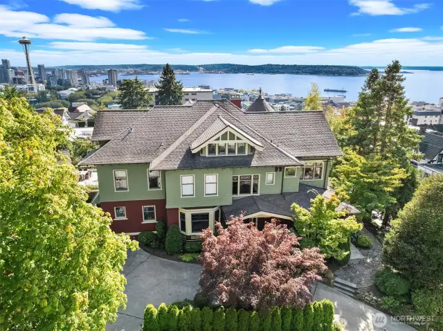 Timeless Style & Endless Views in 1906 Queen Anne Craftsman extensively preserved and restored.