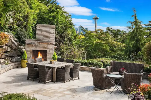 Convenient access to patios, outdoor fireplace and level grassy yard from main floor and lower level.