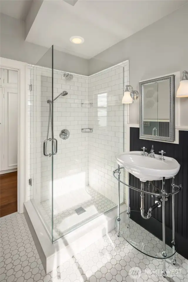 Middle bedroom suite with view terrace, ensuite bath and separate dressing area with built-in closet.