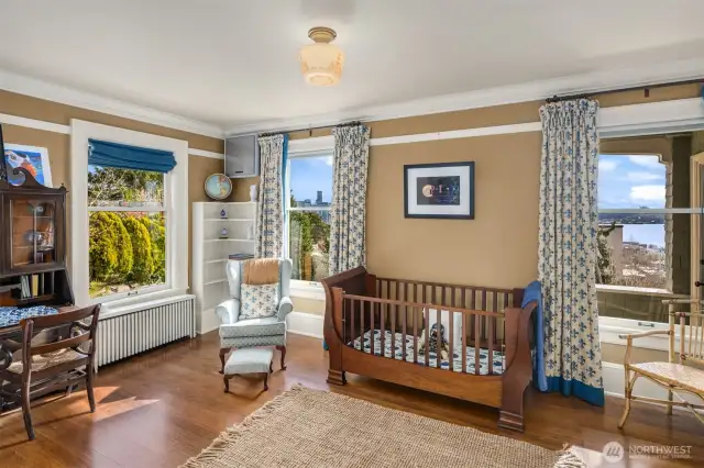 Southeast bedroom has city, bay and garden views plus adjacent full bath.