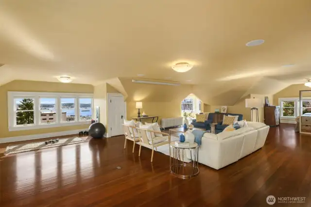 Third level flex space for media, office, dance/yoga- the perfect getaway with views above it all. Large space is flanked by bedrooms, full bath, extra finished room plus kitchenette with sink, microwave, refrigerator, dishwasher and built-in espresso machine.