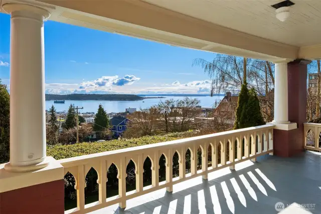 Exquisite architectural details remain intact. Enjoy extensive outdoor living on covered wraparound terraces.