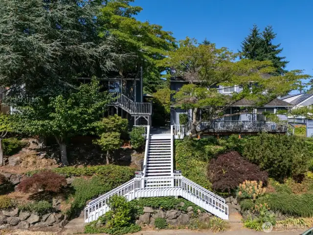 These two homes were built in 1989 and sit above the street for privacy.