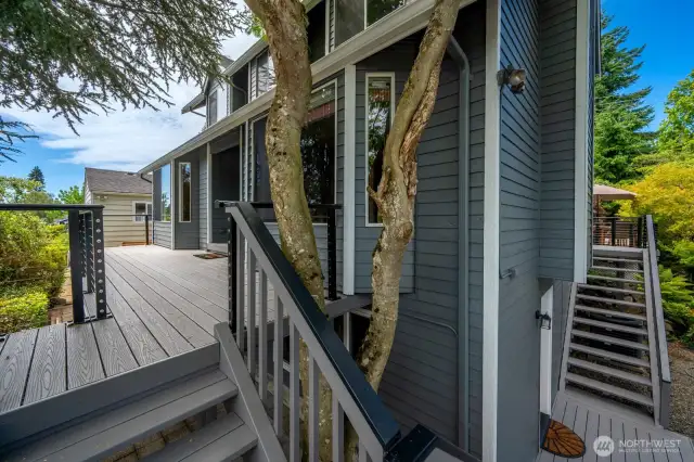 Composite decking and cable railing for easy maintenance.